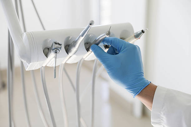 Professional Tooth Extraction technician working in Lexington, TN